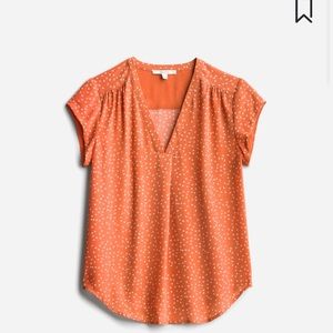 Tangerine sheer top with polka dots